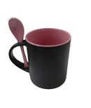 TAZA MAGICA NEGRA INTERIOR Y CUCHARA ROSA 11 OZ