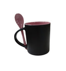TAZA MAGICA NEGRA INTERIOR Y CUCHARA ROSA 11 OZ